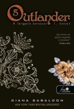 Könyvmolyképző Kiadó Outlander 5. - A lángoló kereszt 1. kötet - kemény kötés